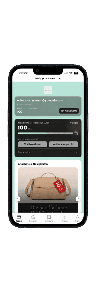 Smartphone displaying an e-commerce app with a beige handbag and a red tag.